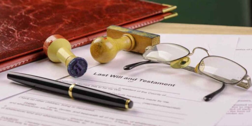 Probate attorney organizing estate documents including will, death certificate, and financial records | What Documents Do You Need to Start Probate